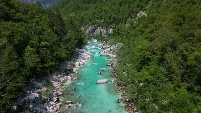 Aerial drone view of River Soča. Picturesque mountain valley and crystal clear turquoise water. Slovenia
