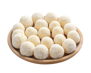 Coconut balls on wooden plate