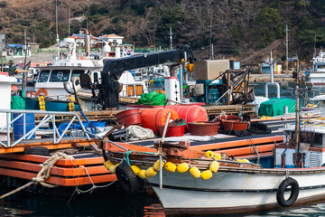 fishing boats moored at the harbor