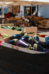 vegetables for sale at an open-air market