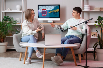 Young people recording podcast on sofa in studio