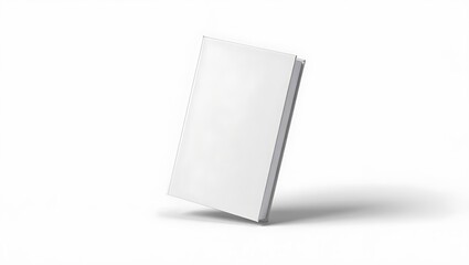 A white hardcover book standing upright on a white surface casting a soft shadow in a studio setting
