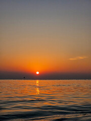 Naklejka premium Sunset over the sea