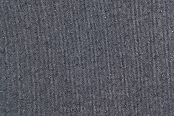 Old worn-out cotton fabric, pilling on a surface