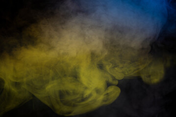Yellow steam on a black background.