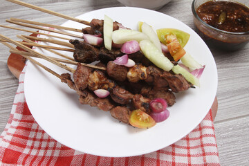 chicken satay on plate