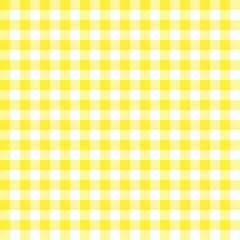 Bright yellow gingham seamless pattern with vibrant yellow and white checkered squares