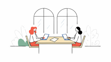 Two Women Working on Laptops at a Table Near a Window