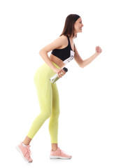 Sporty young woman with water bottle running marathon on white background