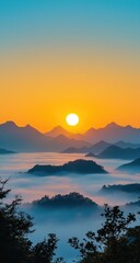 Sunrise over misty mountains