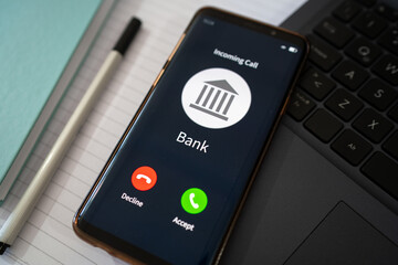 Obraz premium Incoming call from the bank. Concept of get a call from your bank agent.