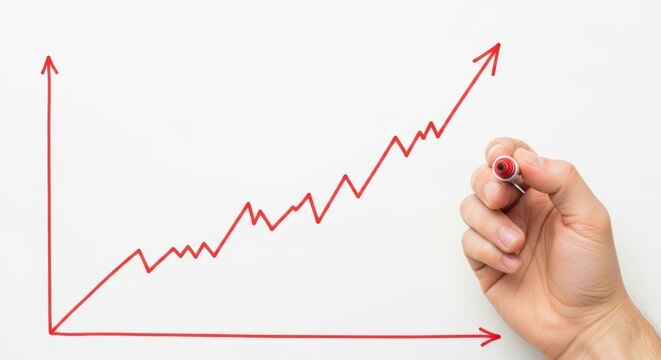 Hand drawing rising red graph line on whiteboard illustrating economic growth and inflation trends