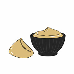 Creamy Mustard Dip in a Black Bowl with a Side of Mustard
