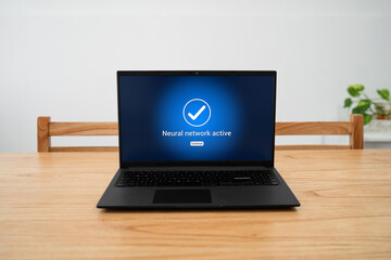 Neural network active notification on laptop screen.
