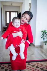 happy young mother with baby girl