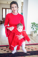 happy young mother with baby girl