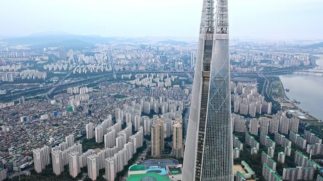 4K Aerial Drone View of Lotte World Tower and Jamsil Skyline, Seoul, South Korea