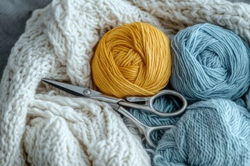 Cozy yarn balls and scissors rest on a textured knitted fabric, showcasing a warm and inviting crafting atmosphere.