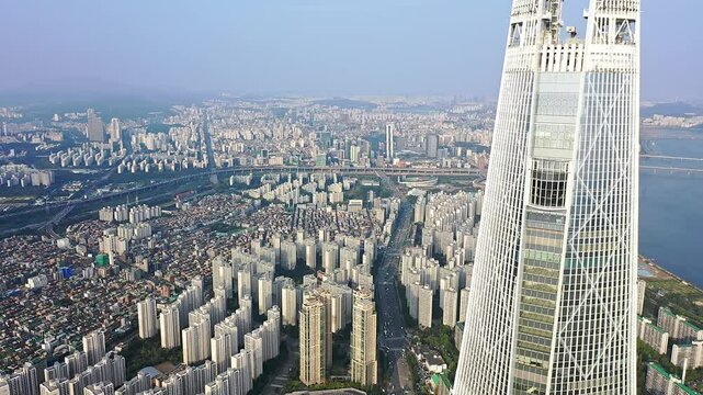 4K Aerial Drone View of Lotte World Tower and Jamsil Skyline, Seoul, South Korea