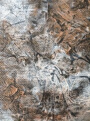 Art photography of abstract painting in bronze white and black colors. This is part of the painting. 