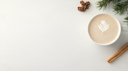 Flat lay of a festive latte with leaf latte art, cinnamon sticks, star anise, and pine branches on a white background. A cozy and minimal winter coffee scene perfect for seasonal designs.