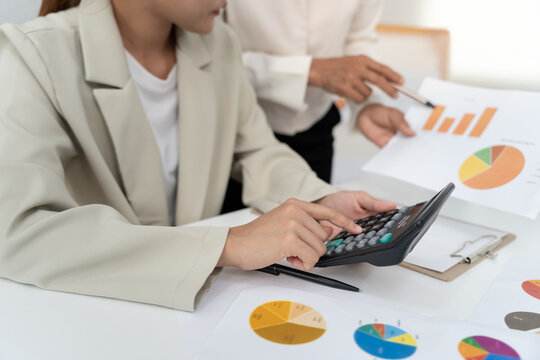 Business team calculate benefit, working woman, spreadsheets, graph financial development, bank accounts, statistics, economy, data analysis, investment analysis, stock exchange, rates income