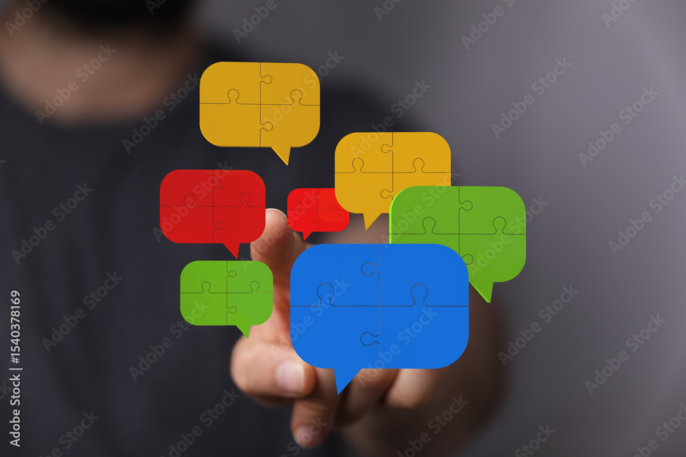 Poster visual of puzzle pieces forming communication bubbles, teamwork, solutions.