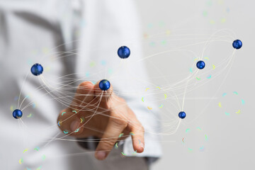 Hand interacting with a digital network, illustrating global connectivity and data exchange.
