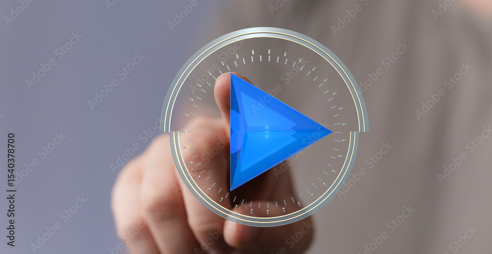 Poster hand interacting with a futuristic play button. concept of media, technology, and digital interactio