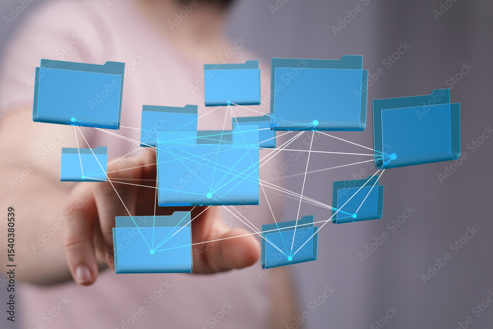 Aufkleber Hand interacting with a network of digital files, illustrating data sharing and collaboration.