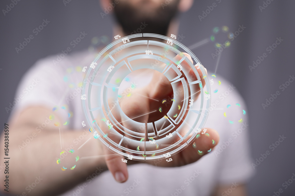 Poster A person uses a futuristic interface to view and analyze data, represented as a holographic circular chart.