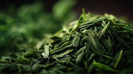 Green tea leaves are showcased in a close-up view, highlighting their freshness and quality
