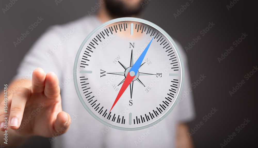 Poster A man uses a digital compass interface to find direction.  Concept for navigation, guidance, or decision-making.