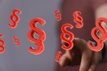 Abstract 3D rendering of red paragraph symbols.  Perfect for legal, law, and justice themes.