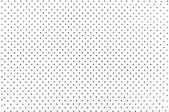 Abstract white light background with many lots of holes polka dot close-up texture,leather macro,seamless pattern