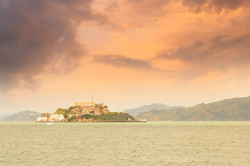 Alcatraz Island, also known as The Rock at sunset, San Francisco, California.  The island is the infamous former federal prison located in San Francisco Bay serving as a maximum-security prison.