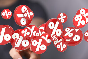 3D rendering of red percentage symbols floating, ideal for sale, discount, finance, and interest...