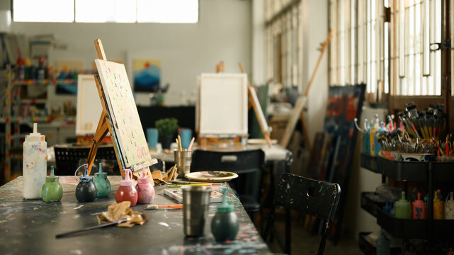 Creative Art Studio with Painting Supplies and Easels, Artistic Workspace Concept