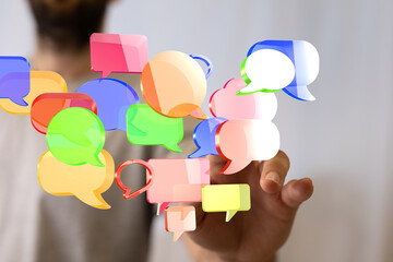 Abstract image of colorful speech bubbles, symbolizing communication, conversation, and social...