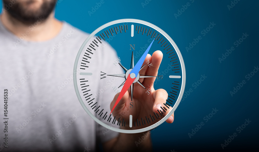 Poster A man interacts with a digital compass, illustrating guidance and direction. Ideal for navigation, strategy, and planning concepts.