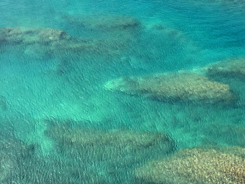 Blue turquoise sea water surface aerial view