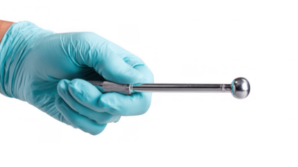 Close up of a surgeon's hand in a sterile glove holding a surgical instrument, emphasizing precision and readiness in a medical setting with transparent background