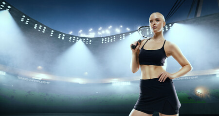 Woman tennis player playing tennis on professional tennis stadium in night.