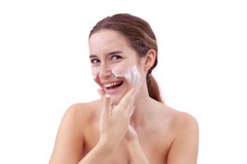 Happy smile young woman cleansing her face with foaming cleanser, hands covered in foam while applying it to her skin. Skincare routine for clean, healthy face. Isolated on white background, acne care