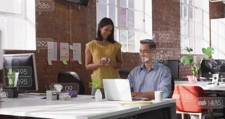Man typing keys pointing while woman holding mug approaching causing floating social media metrics - Powered by Adobe