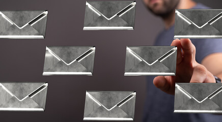 Abstract image of a man interacting with digital email icons.  Concept for communication,...