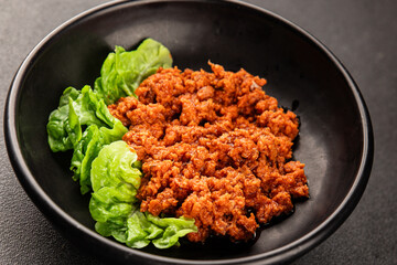 Tuna tomato sauce canned fish seafood fresh delicious gourmet food background on the table rustic food top view copy space keto and paleo diet vegan food pescetarian diet