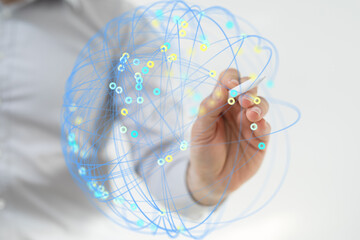 Hand drawing a global network, illustrating connections and data flow. Ideal for technology,...