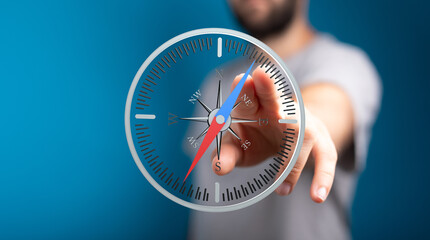 Person interacts with a virtual compass, finding direction and navigating.  Concept for guidance,...