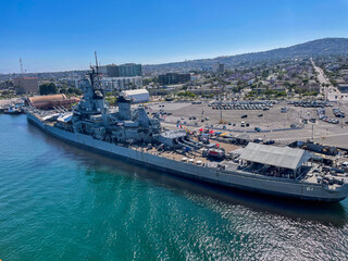Port San Pedro, Los Angeles, California, June 2, 2025: The Port of San Pedro looking at the USS Iowa Battleship from a Cruise Ship showing the Size Comparison